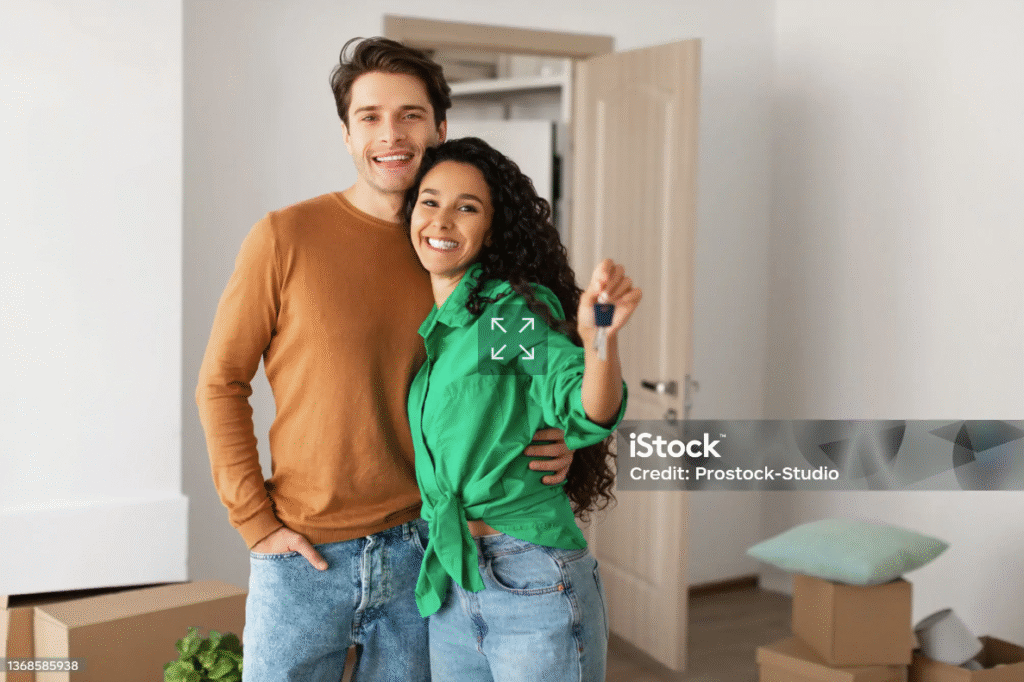 Happy homeowners representing the Operation HOPE DeKalb home ownership partnership.