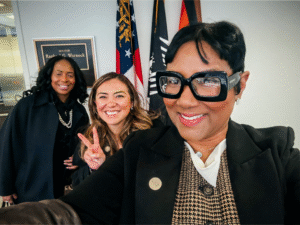 A friendly selfie of Lorraine Cochran-Johnson with community members.